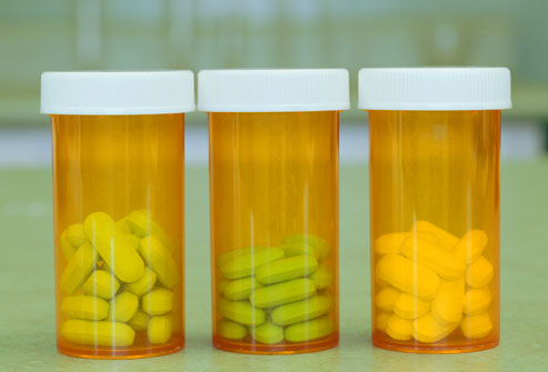 three pill bottles