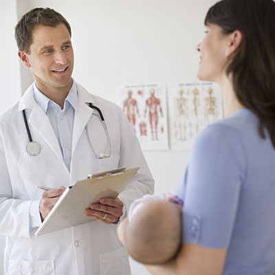 women baby pediatrician